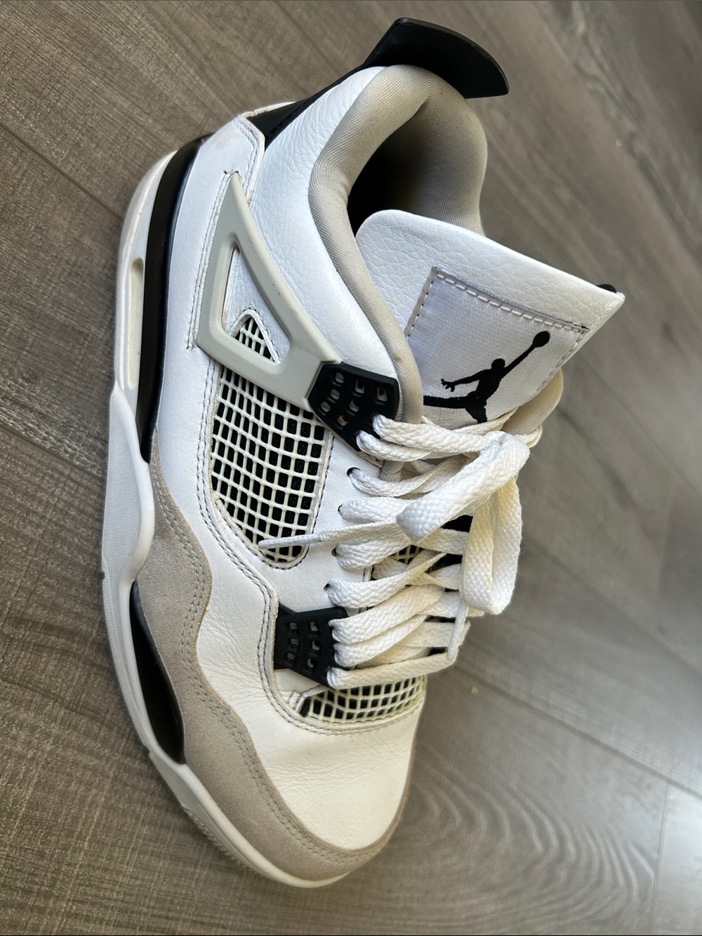 Jordan 4s, military black Sneakers.